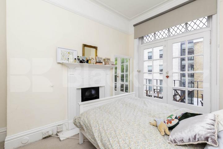 Three double bedrooms, two bathrooms, high ceilings and a spacious lounge. Melcombe Court, Dorset Square, Baker Street